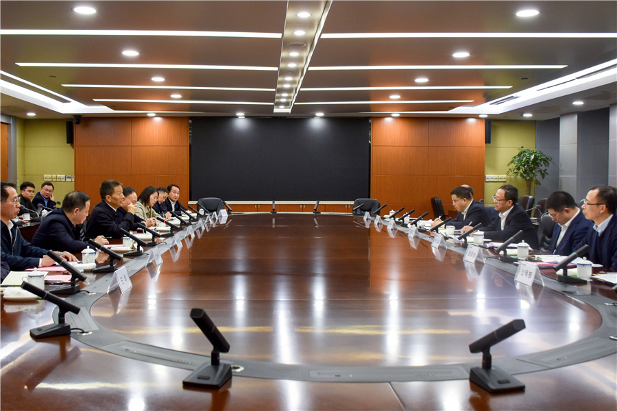 許忠建赴上海市拜訪交通銀行